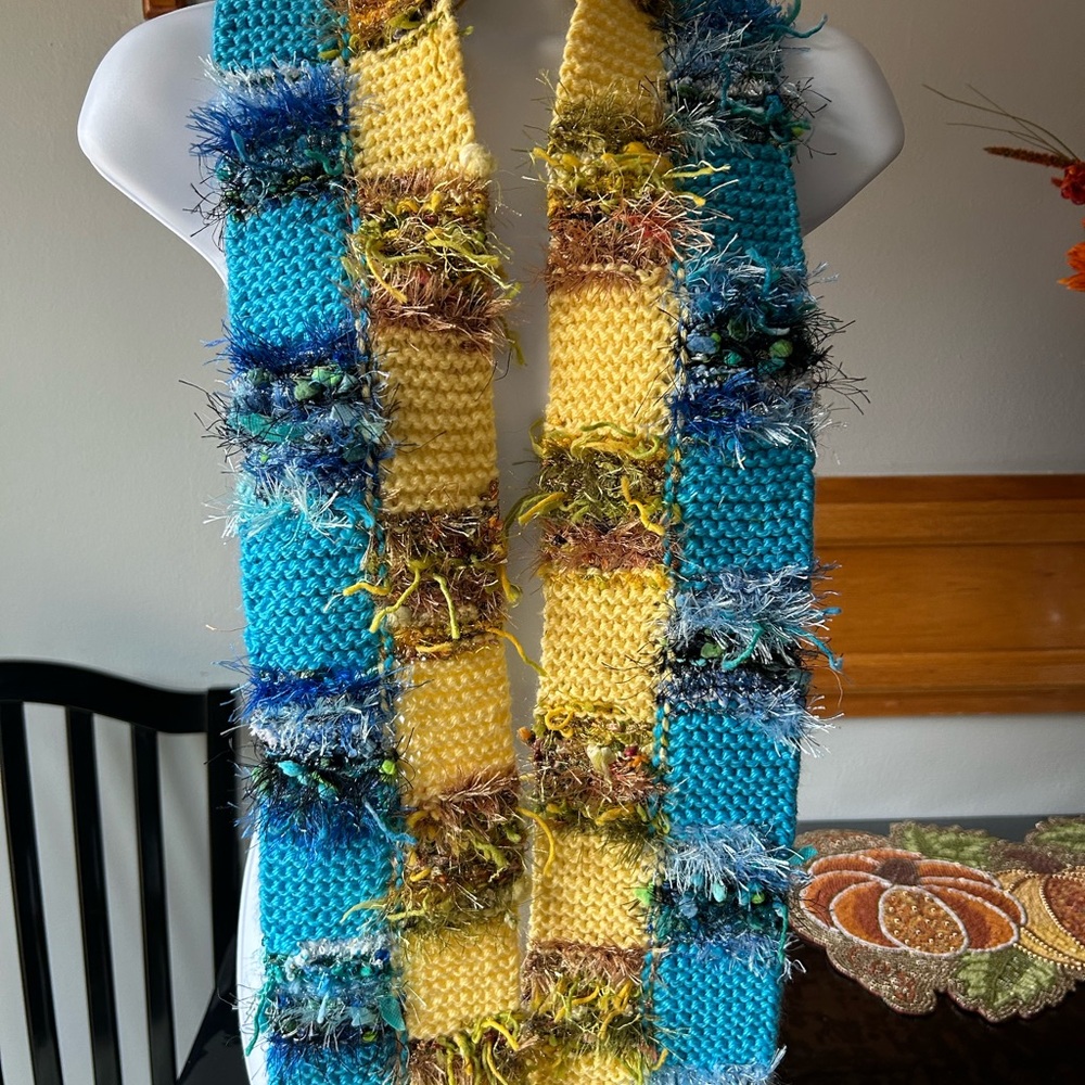 Vibrant Knit Scarf with Blue and Yellow Accents